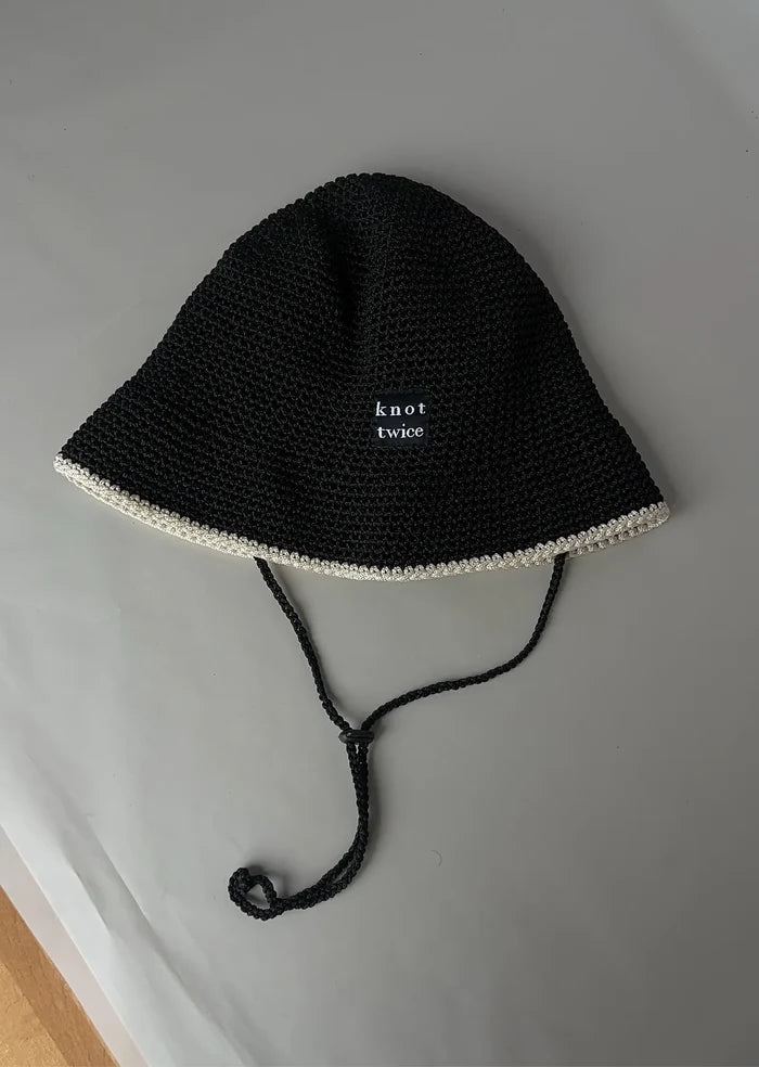 Knot twice-hatt