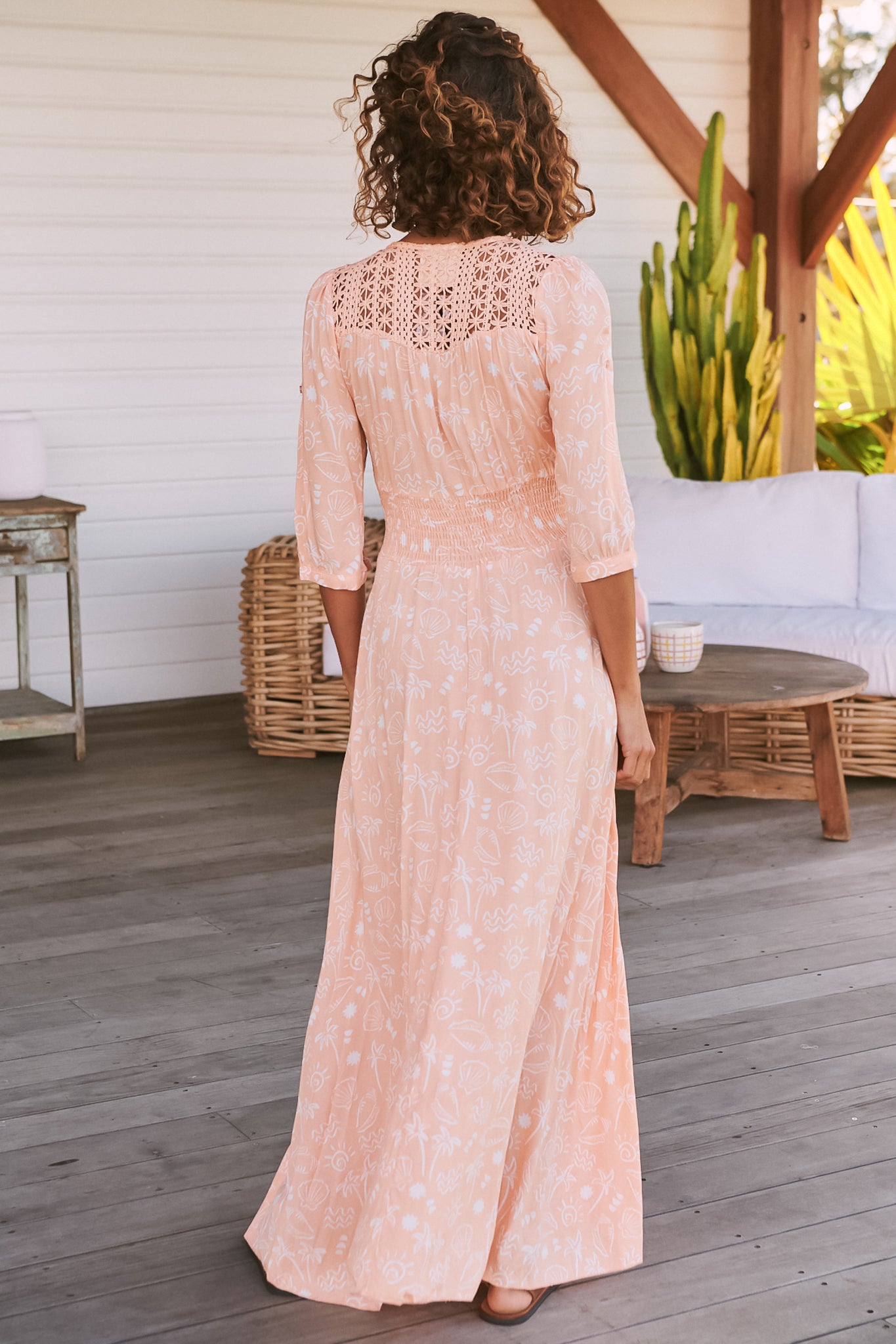 JAASE - Indiana Maxi Dress: Lace Back Shirred Waist A Line Dress with Handkerchief Hemline in Peach Island Print