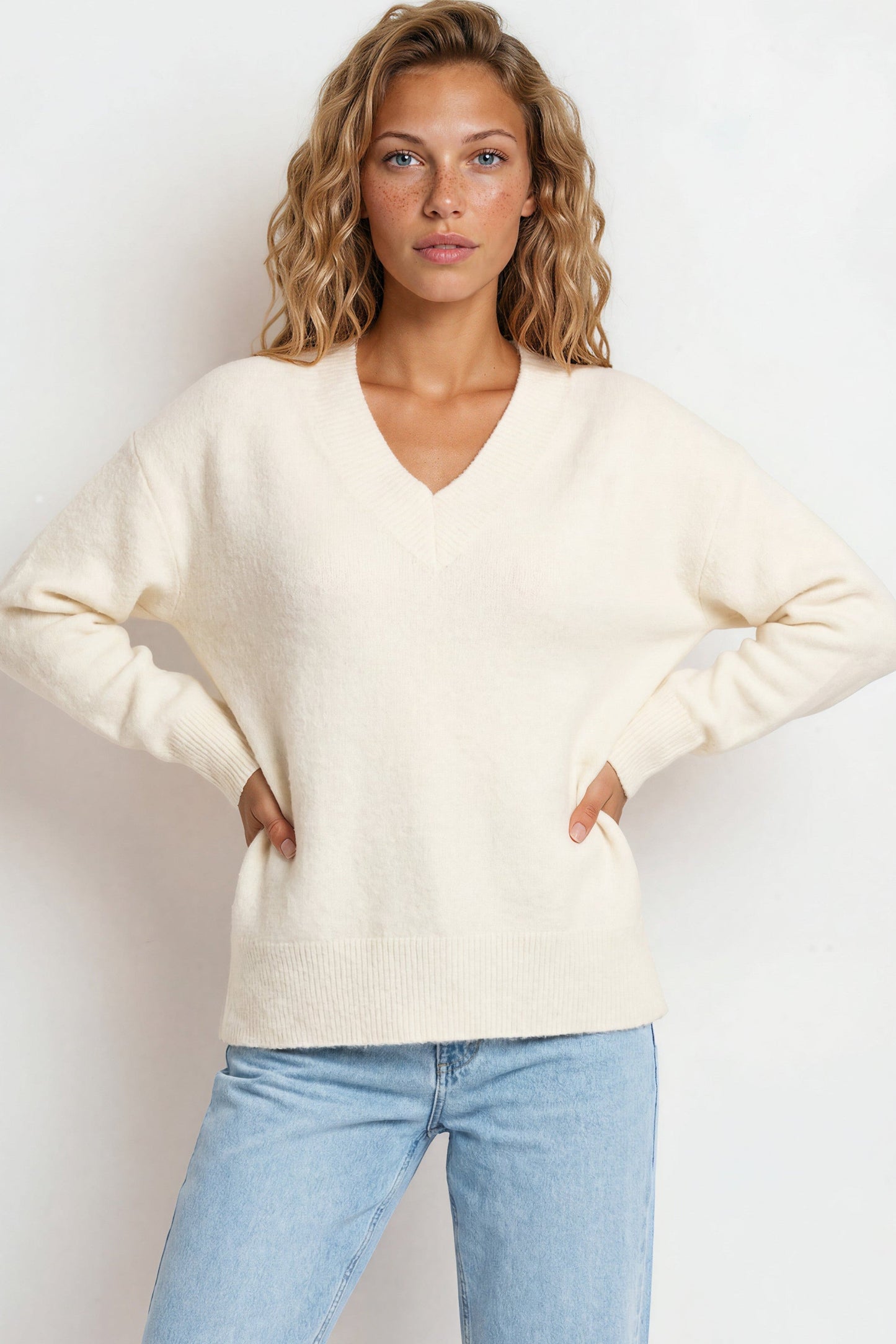 Nikita Jumper - Thick Ribbed V-Neck Knit with Side Split Hemline in White