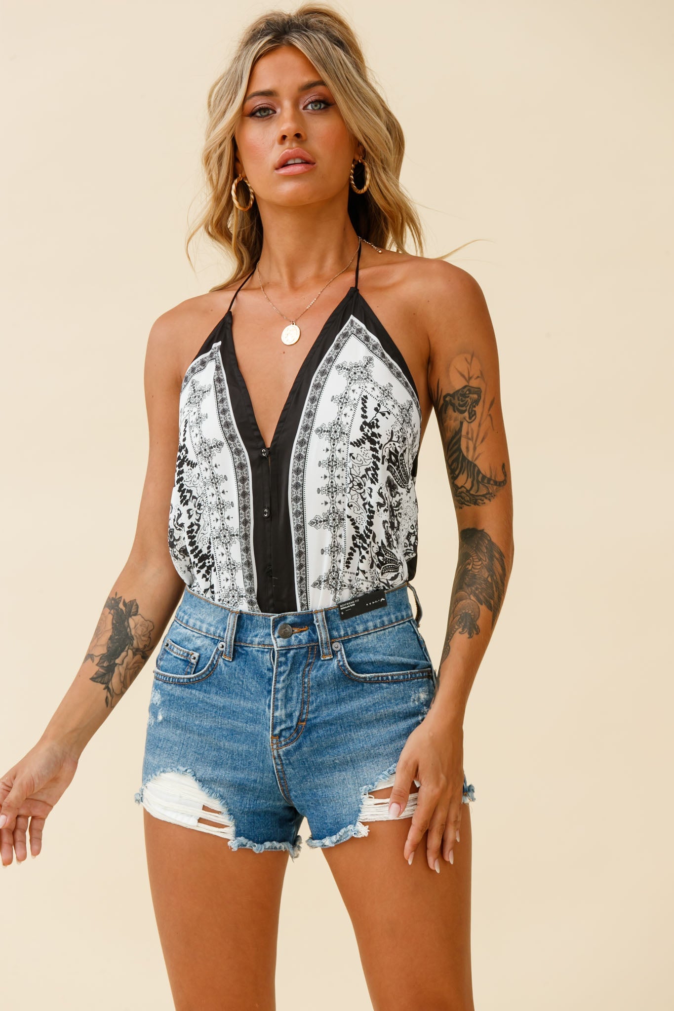 Get Loud Button Front Open Back Bodysuit Paisley Print Black