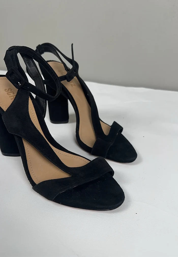 Schutz-skinnklackar